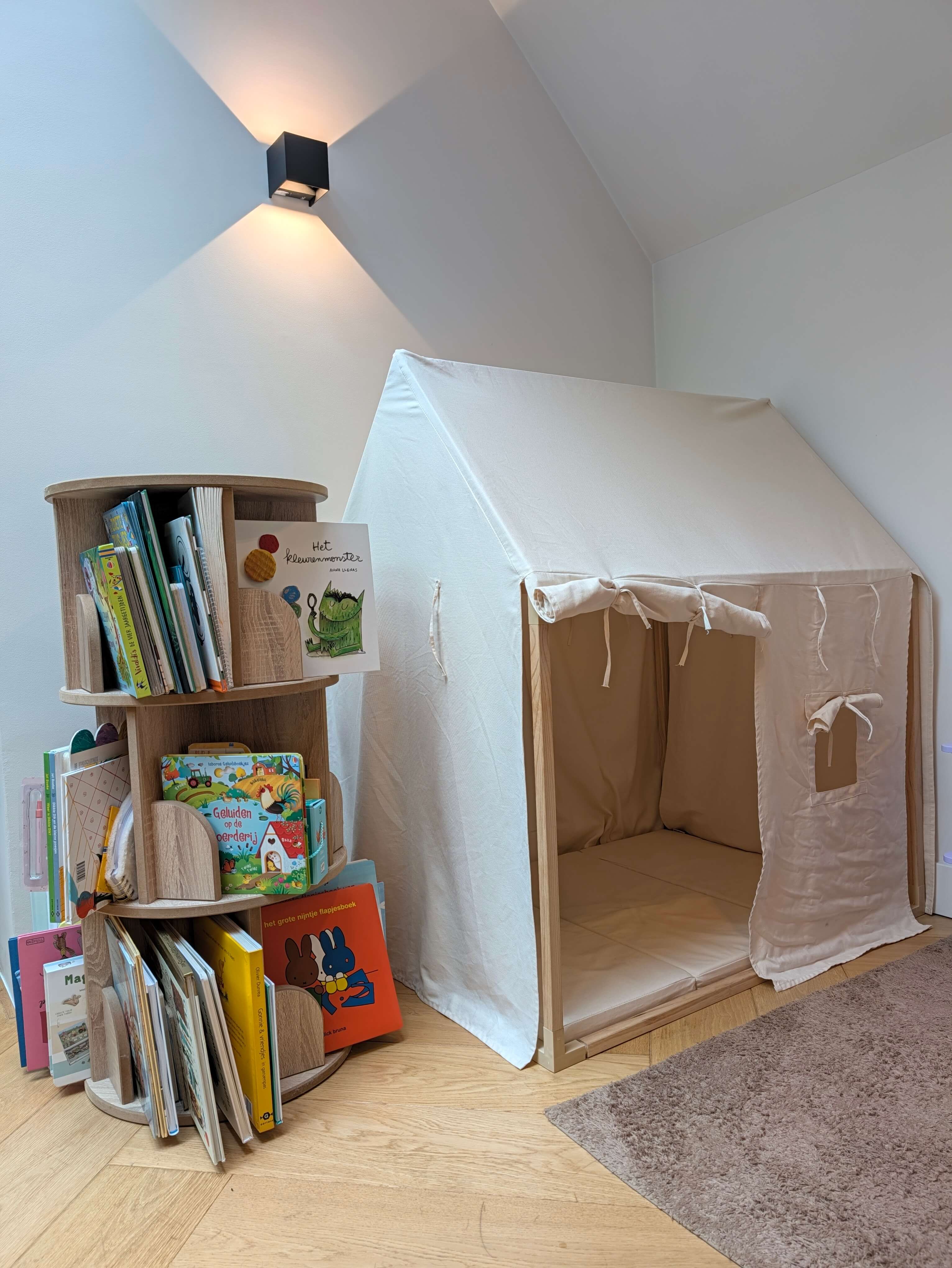 Play corner with wooden toys & tent